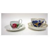 1033	2 MEISSEN CUPS AND SAUCERS WITH FLORAL DECORATIONS, LARGEST IS 3 1/2 IN HIGH