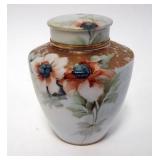 1148	NIPPON HAND PAINTED COVERED JAR WITH FLOWERS, 4 3/4 IN HIGH