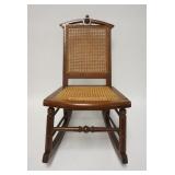 1233	WALNUT VICTORIAN CHILDS ROCKER CANED SEAT & BACK 27 IN H 