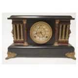 1259	VICTORIAN MANTLE CLOCK W/ ORNATE BRASS OVERLAY ON THE FACE.