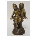 1262	BRONZE OF A MAN & WOMAN. 9 3/4 IN H 