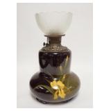 1043	LOUWELSA WELLER ART POTTERY KEROSENE LAMP, IRIS PATTERN, POTTERY PORTION IS 10 IN HIGH
