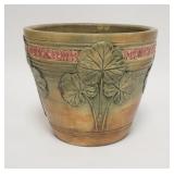 1063	WELLER JARDINIERE, HAS A HAIRLINE DOWN FROM THE TOP, 8 3/4 IN HIGH, 10 IN TOP DIAMETER