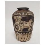 1069	BLACK & WHITE POTTERY VASE DECORATED W/CHARIOTS, 7 1/4 IN HIGH