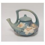 1091	ROSEVILLE MAGNOLIA BLUE TEAPOT, 8 IN HIGH