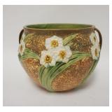 1122	ROSEVILLE DAFFODIL POT, HAS A SMALL RIM CHIP BY A HANDLE, 7 1/4 IN HIGH
