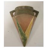 1125	ROSEVILLE FUTURA WALL POCKET, HAS A FLAKE ON THE LOWER RIGHT SIDE & A RIM NICK, 8 1/4 IN HIGH