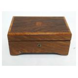 1022	SMALL MUSIC BOX IN INLAID WOODEN CASE, MADE IN SWITZERLAND, 3 TUNES. 6 IN X 4 IN X 2 3/4 IN HIG