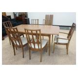1046	BROYHILL BRASILLIA TABLE AND CHAIRS WITH 2 ARM CHAIRS AND 4 SIDE CHAIRS. TABLE IS 66 IN X 60 IN