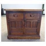 1051	2 DOOR 2 DRAWER CHEST W/ A BREADBOARD TOP 1 1/4 IN THICK, 39 1/2 IN W 35 IN H 21 IN DEEP. HAS P