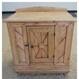 1053	1 DOOR PINE WASH STAND. 29 IN W 33 IN H 19 IN DEEP