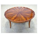 1081	SCALLOPED EDGE COFFEE TABLE W/ PATTERNED VENEER TOP. 40 IN DIAMETER, 18 IN H 