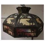 1086	MULTI COLOR SLAG GLASS DOME W/ METAL OVERLAY, ONE PANEL HAS BEEN REPAIRED. APP. 20 IN 