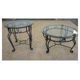 1088	2 IRON GLASS TOP TABLES. 24 IN DIAMETER, 27 IN H, & 32 IN DIAMETER, 17 1/4 IN H 