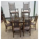 1091	OVAL DINING TABLE & 8 CHIARS. TABLE HAS AN INTAGLIO CARVING & FOUR 12 IN SKIRTED LEAVES, CHAIRS