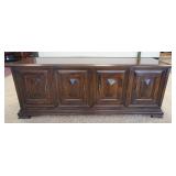 1094	WALNUT SERVER W/ FOUR RAISED PANELED DOORS & THREE CONCEALED DRAWERS. 72 IN W X 19 IN, 27 IN H 