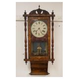 1113	CONTINENTAL WALL CLOCK W/ A FRET WORK CUT OUT & INLAY CASE, CARVED CREST. 36 IN H 	PLEASE PAY A