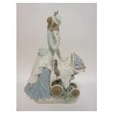 1123	LLADRO WOMAN W/ BABY IN STROLLER 13 IN 