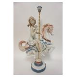 1124	LLADRO YOUNG GIRL ON CAROUSEL 15 IN 