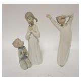1144	TWO LLADRO FIGURES; BOY YAWNING & CHILDREN PRAYING. 9 IN 