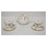 1184	DUCHES *JUNE BOUQUET* TEAPOT & TWO CUPS & SAUCERS. TEAPOT IS 6 1/4 IN H 
