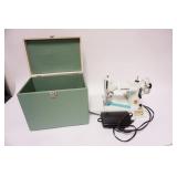 1228	SINGER 221 K WHITE FEATHERWIGHT SEWING MACHINE 8 1/4 IN X 12 1/2 IN 11 IN H 