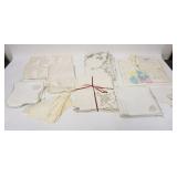 1244	LINEN LOT W/ TABLE CLOTHES & NAPKINS HAS SOME STAINING 