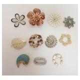 1339	11 BROOCHES