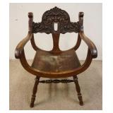 1054	CARVED OAK NORTHWIND ARM CHAIR, 23 1/4 IN WIDE X 35 1/2 IN HIGH