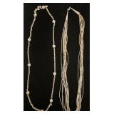1117	2 NECKLACES, 1 MARKED STERLING SILVER. MULTI STRAND NECKLACE IS UNMARKED