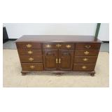 1136	NINE DRAWER, TWO DOOR CHEST WITH INTERIOR DRAWERS BEHIND THE DOORS. 68 IN WIDE X 34 IN HIGH