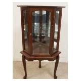 1154	SMALL MIRROR BACK CORNER CURIO CABINET ON CABRIOL LEGS. WEAR TO TOP FINISH. 21 1/4 IN X 39 1/2 