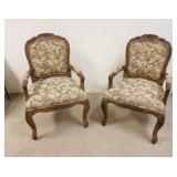 1179	PAIR OF UPHOLSTERED CARVED CENTURY ARM CHAIRS