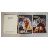 1002	LOT OF THREE BACK TO THE FUTURE MOVIE PRESS KITS FOR THE 1ST 2ND & 3RD FILMS, ALL INCLUDE PRINT
