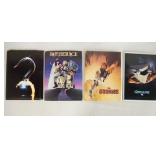 1008	LOT OF FOUR MOVIE PRESS KITS INCLUDING GREMLINS, THE GOONIES, BEETLEJUICE, & HOOK. KITS CONTAIN