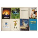 1037	LOT OF EIGHT DISNEY MOVIE PRESS KITS. LOT INCLUDES, TOY STORY 2, MONSTERS INC., PETER PAN, A BU