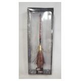 1059	HARRY POTTER TONNER FIREBOLT IN ORIGINAL BOX. APP. 15 1/4 IN L 
