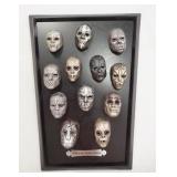 1088	HARRY POTTER THE NOBLE COLLECTION DEATH EATER MASK COLLECTION ON PLAQUE. 16 1/4 IN X 12 IN . 