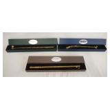 1127	LOT OF THREE THE NOBLE COLLECTION HARRY POTTER WAND REPLICAS, LOT INCLUDES HERMOINE GRANGER, TH