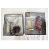 1129	LOT OF TWO HARRY POTTER TONNER FIGURES; HEDWIG & FAWKES. THE PERCH FOR FAWKES FIGURE HAS BEEN R