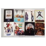 1144	LOT OF EIGHT COMEDY MOVIE PRESS KITS INCLUDING, GREEDY, JIMMY HOLLYWOOD, KINDERGARTEN COP, JING