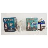 1173	LOT OF TWO NECA HARRY POTTER TABLE LAMPS W/ ORIGINAL BOXES. LOT INCLUDES THE TRIWIZARD CUP 12 I