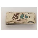 1039	STERLING SILVER MONEY CLIP, HAS A HAND DECORATION, 0.595 TOZ