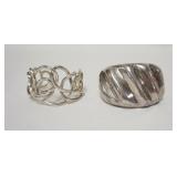 1045	2 STERLING SILVER CUFF BRACELETS, ONE IS FILLED, UNFILLED BRACELET IS 1.57 TOZ