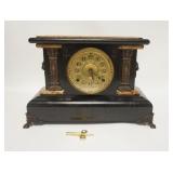 1087	SETH THOMAS VICTORIAN CLOCK, LION HEADS & LABEL, HAS KEY & PENDULUM