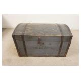1109	DOME TOP IMMIGRANTS CHEST, STRAP IRON EDGES, ORIGINAL OWNERS NAME CARVED & PAINTED, 31 IN WIDE 