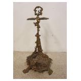1134	BRASS UMBRELLA & CANE STAND W/HUNT MOTIF & RECLINING DOG AT BASE, DAMAGE TO TOP, 21 IN HIGH