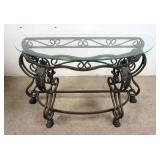 1167	GLASS TOP DEMILUNE TABLE WITH FANCY METAL BASE, 4 FOOT X 21 IN DEEP X 30 IN HIGH