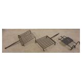 1197	3 PIECES OF ANTIQUE WROUGHT IRON KITCHEN IMPLEMENTS. 2 TOASTERS AND A SLIDING TRIVET. LARGEST I