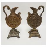 1203	PAIR OF ORNATE METAL MANTLE GARNITURES, THEY HAVE CHERUBS, ETC. 14 IN HIGH